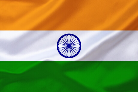 Orange-weiß-grüne Flagge mit blauem Emblem
